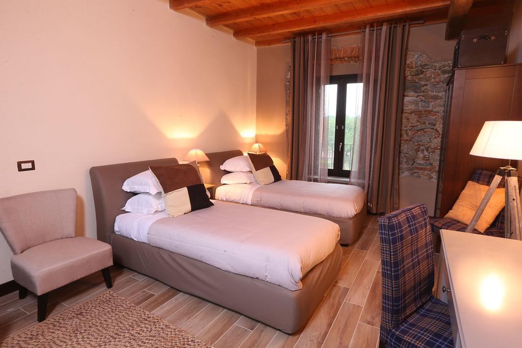 Hotel Equirelais à Lomnago Chambre photo